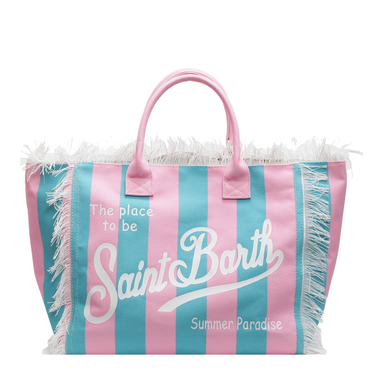 The new style of tide letter fringe canvas large capacity tote bag simple commuting with all fashion shoulder bag 2025