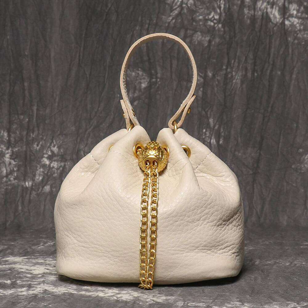 LUOKIR New Metal Drawstring Versatile Women's Handbag Genuine Leather Chain Crossbody Vintage Bucket Mobile Phone Bag 20250813