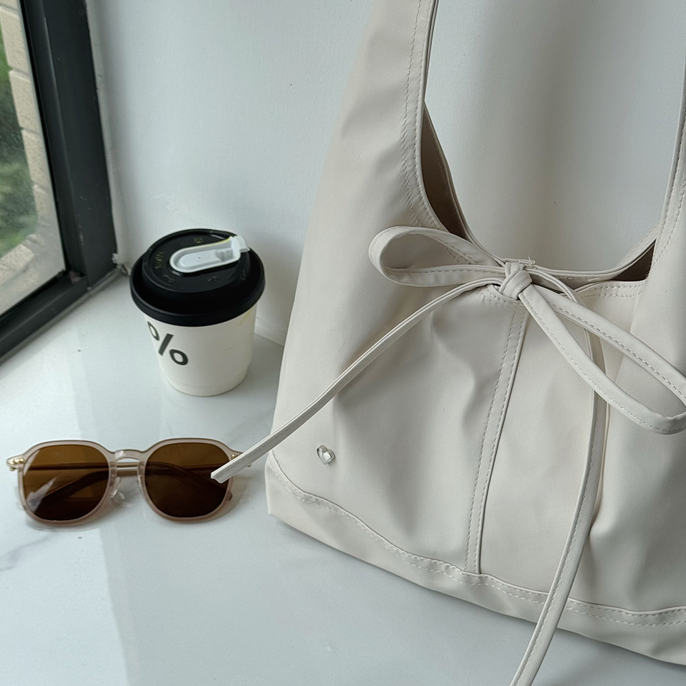 2025 New Niche Design Commuter Versatile Casual Bowknot Large Capacity Single Shoulder Underarm Tote Bag for Women ddmymarket
