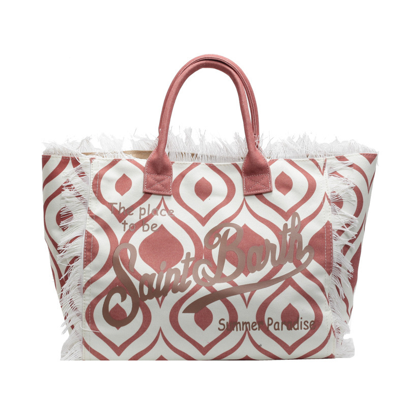 The new style of tide letter fringe canvas large capacity tote bag simple commuting with all fashion shoulder bag 2025