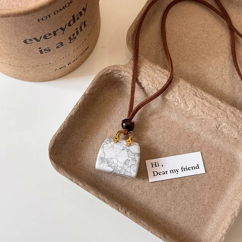 Vintage Cute Small Stone Bag Pendant Long Necklace for Women Korean Velvet Sweater Chain Jewelry Versatile Hanging Accessory 250811