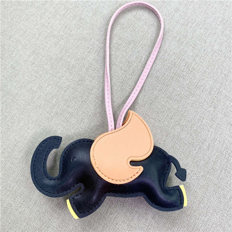 Bag Charms New Designer charm Angel Dumbo Bag Pendant Cute Personalized Keychain Car Rearview Mirror Decoration