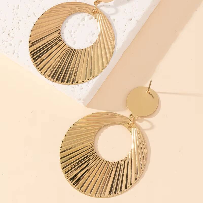 Stainless Steel Personality Exaggerated Threaded Water Drop Hollow Earrings