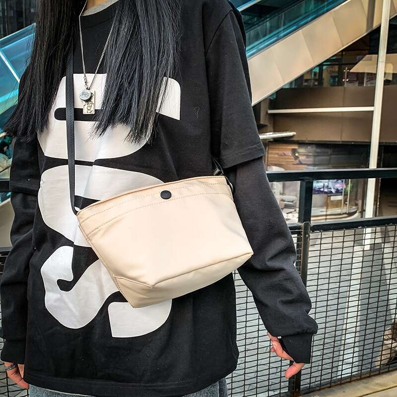 2025 New Korean Style Simple Crossbody Bags Designer Women Small Women Versatile Oxford Cloth Shoulder Harajuku Casual Bucket Bag for Men