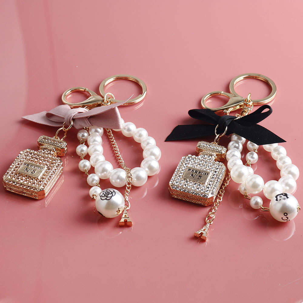 Korean Version Creative Full Diamond Inlaid Perfume Bottle Keychain for Women, Bowknot Pearl Bag Pendant Small Gift