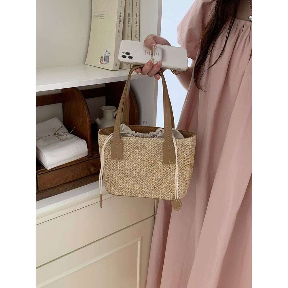 Korean ins grass woven small summer new leisure vacation women's vegetable basket portable shoulder messenger bag