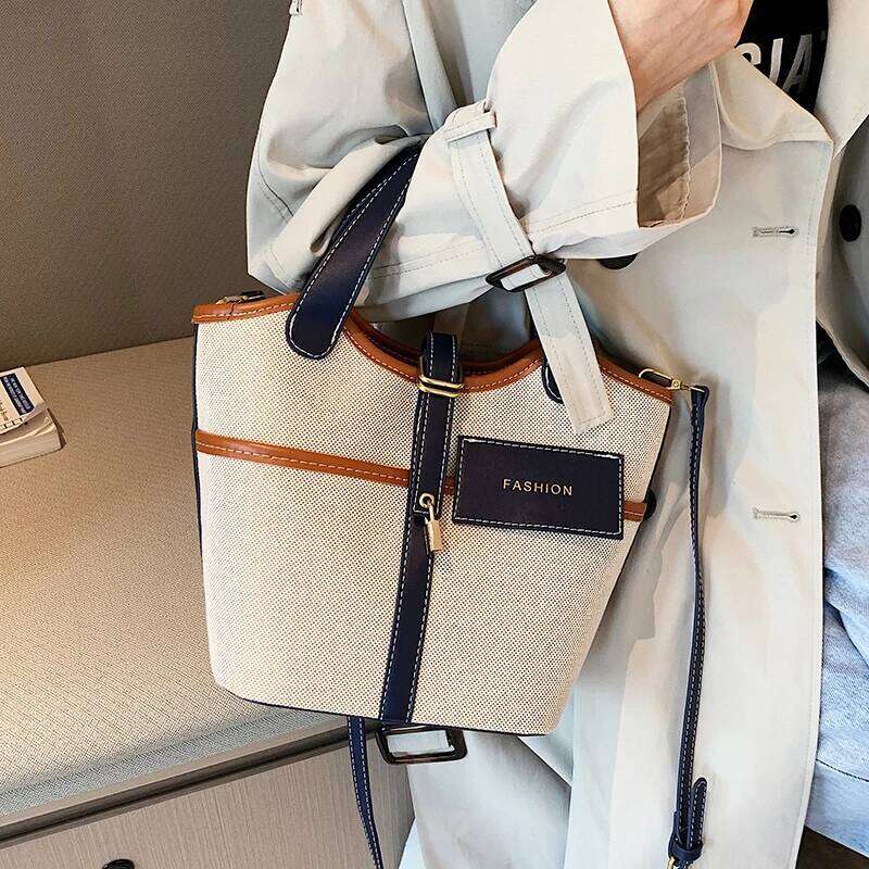 Retro Canvas PU Spliced Bucket New Women S Personalized Design Large Capacity Crossbody Bag Versatile Commuting Handbag