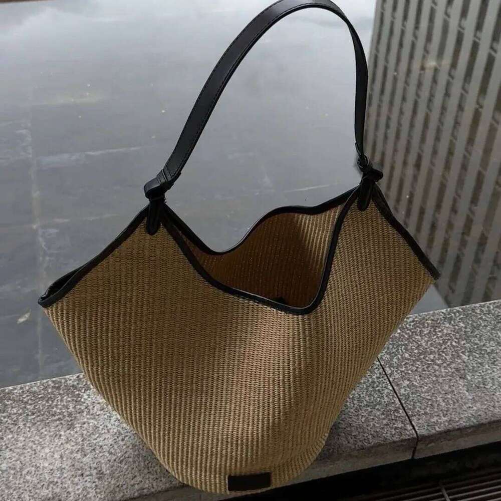 Lafite splicing head layer cowhide woven 2025 new niche design fashion summer vacation beach women underarm shoulder bag