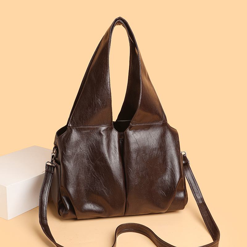 Women's crossbody bag 2025 designer's new fashionable simple retro solid color commuting shoulder bag