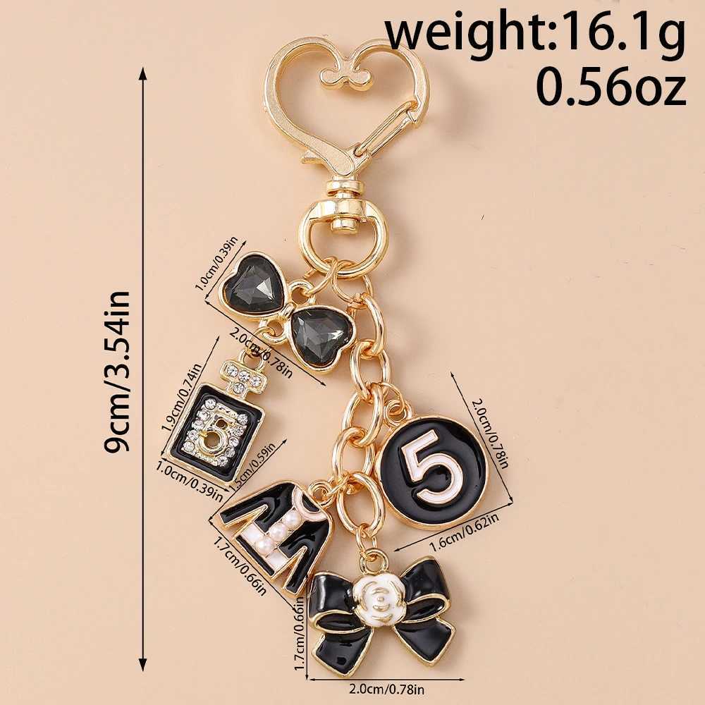 Fashion Enamel Women Hat Coat Keychain Pearl Flower Key Ring Pendants for Handbag Decoration DIY Handmade Jewelry Gifts Y250814