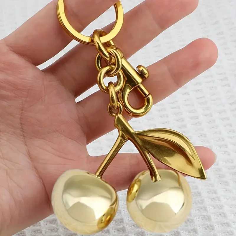 Golden Cherry Keychain Charm Shiny Resin Metal Bag Accessory Elegant Gift for Women Purse or Handbag Decoration S250902