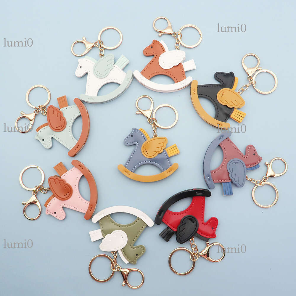 New Hot-Selling Shaking Pegasus Keychain Creative Bag Pendant PU Leather Little Wooden Horse Car Ornament
