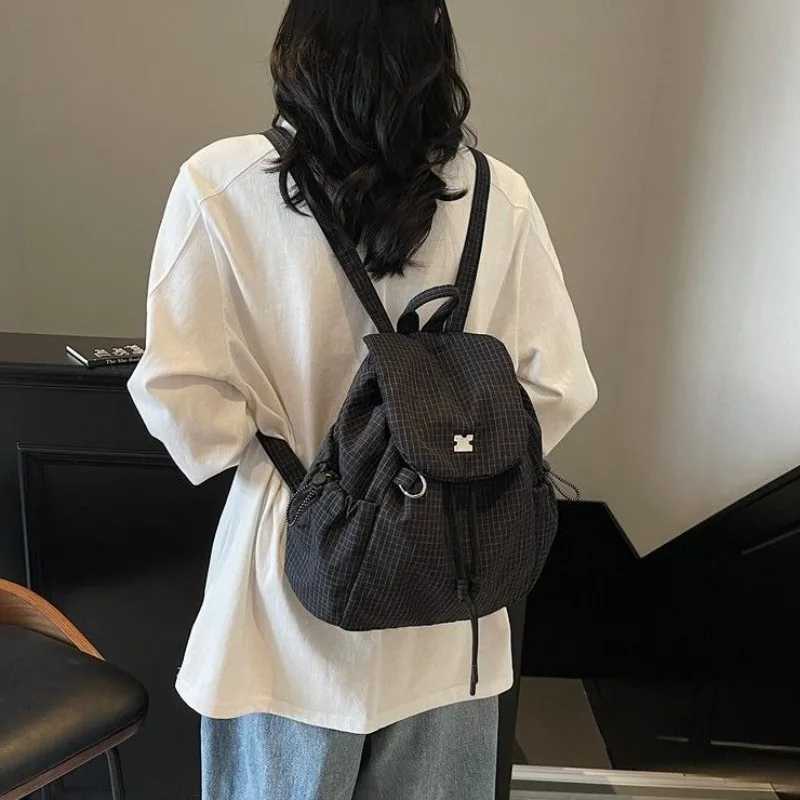 2025 New Womens Split Type Grid Canvas Mountaineering Bag College Double Shoulder Casual Backpack Single Shoulder Bucket Bag XJ250814