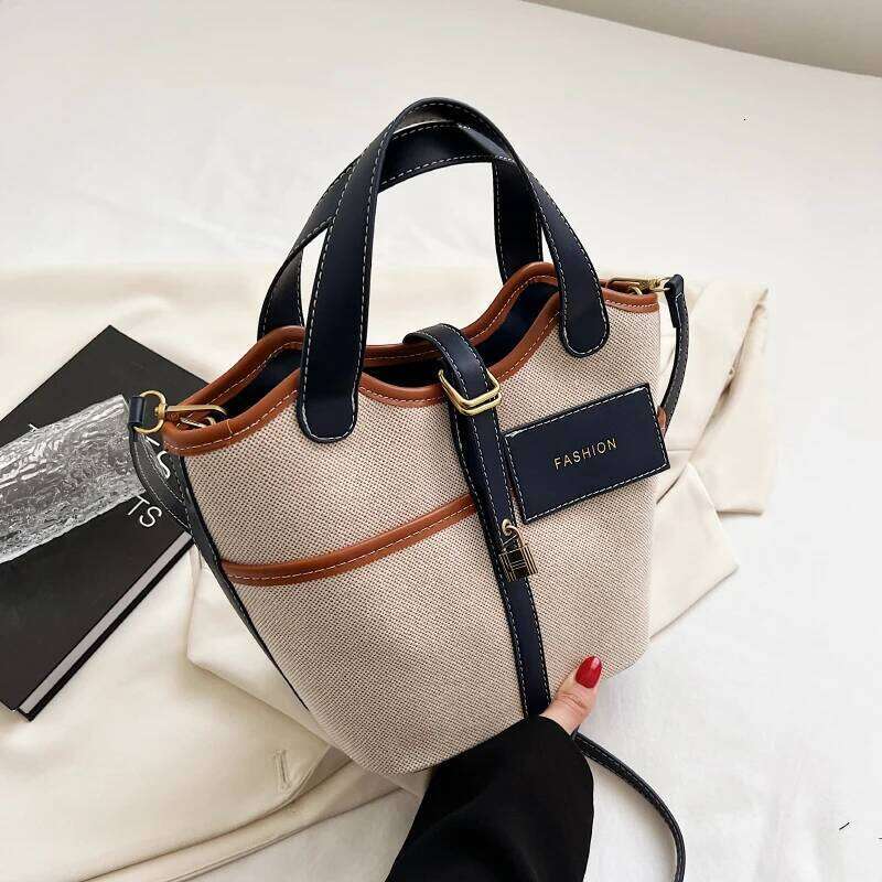 Retro Canvas PU Spliced Bucket New Women S Personalized Design Large Capacity Crossbody Bag Versatile Commuting Handbag