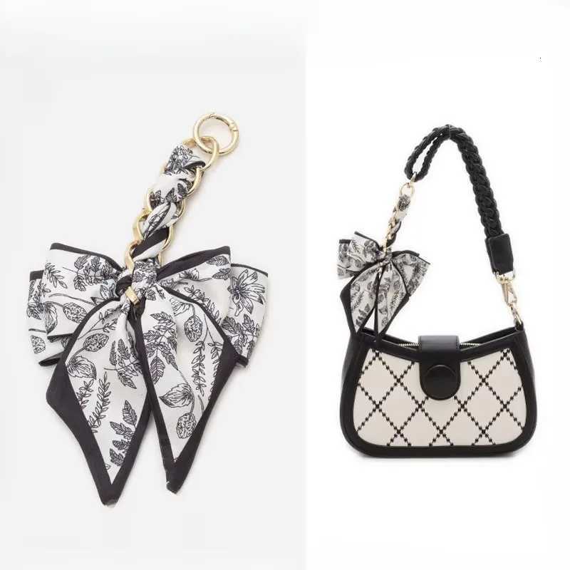 Womens Bag Extension Chain Bow Tie Bag Backpack Strap Hanging Chain Strap DIY Bag Chain Fashion Funny Black Color Simple Pendant Y250814