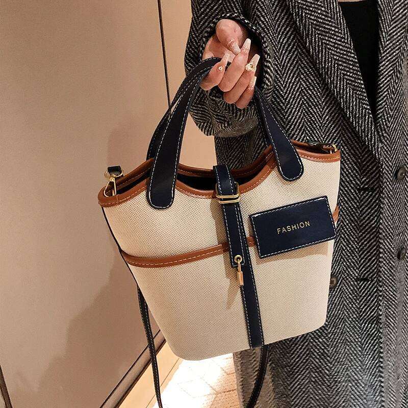 Retro Canvas PU Spliced Bucket New Women S Personalized Design Large Capacity Crossbody Bag Versatile Commuting Handbag
