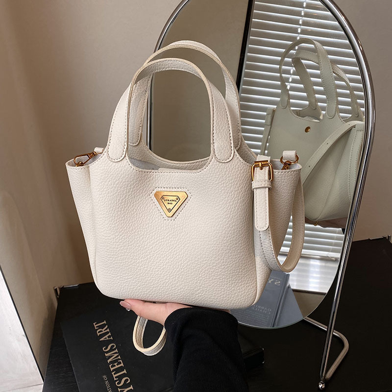 Urban Minimalist Women's Retro Bucket Bag Free Shipping Designer Large Capacity New Handbag Versatile Niche Single Shoulder Crossbody Bag Casual 