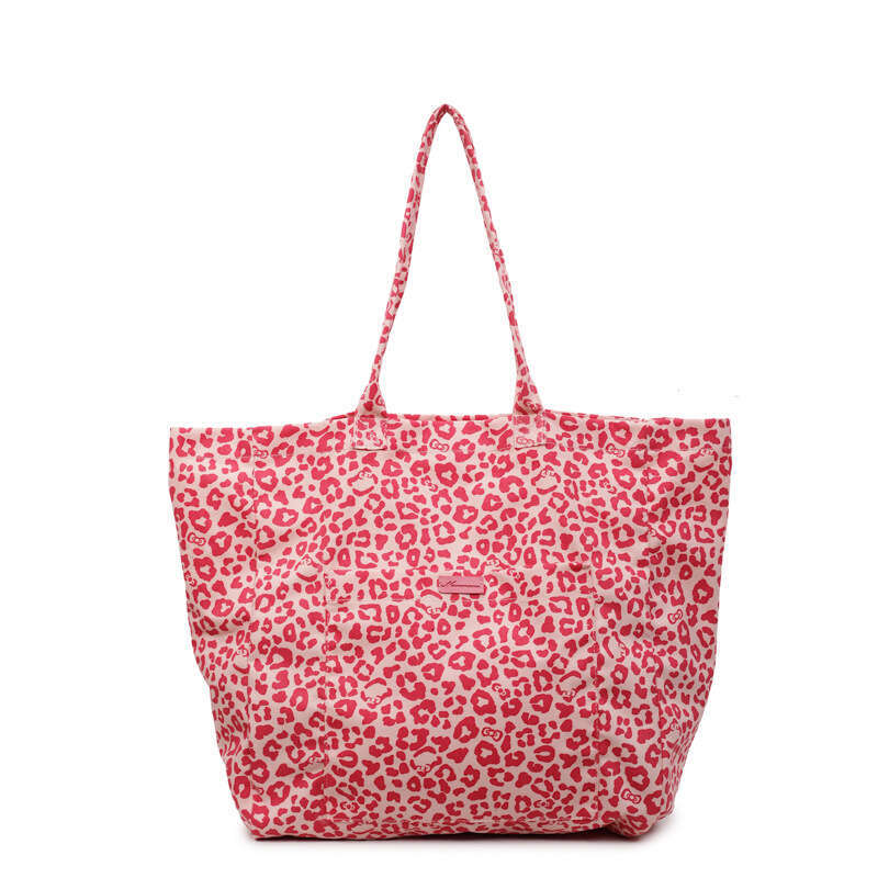 Niche Leopard Print Canvas for Women 2025 New Fashion Versatile Shoulder Large Capacity Tote Commuter Underarm Bag
