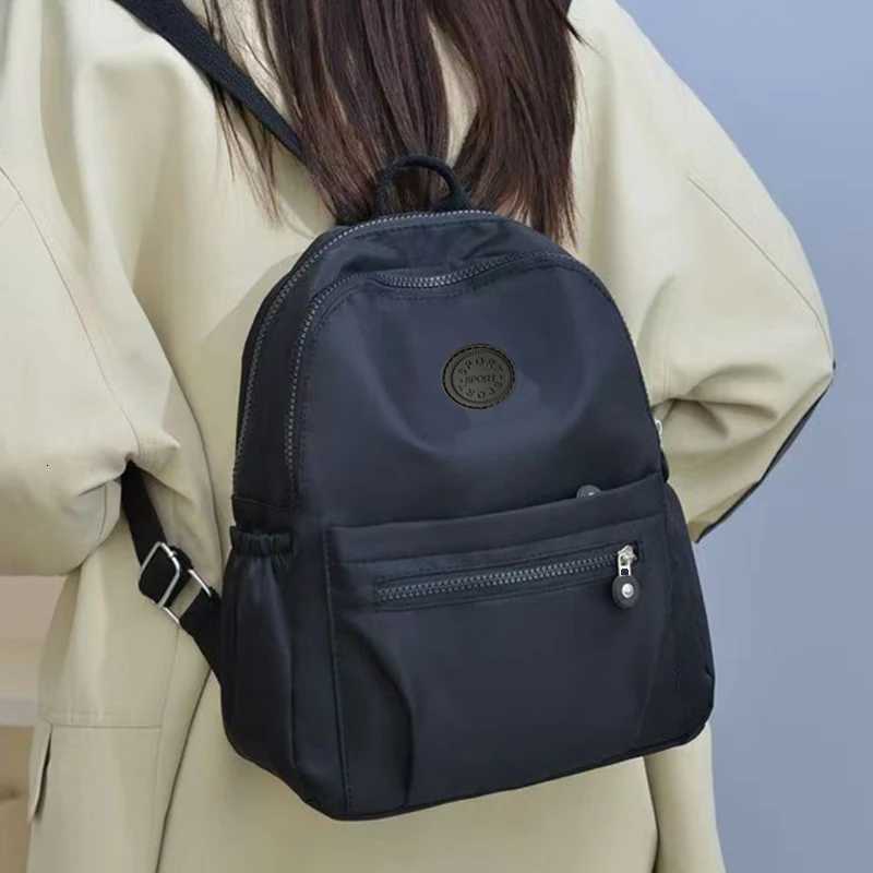 Mens and Womens Korean-style Fashionable Oxford Cloth Waterproof Nylon Fabric Casual Motorcycle BackpackXJ250814