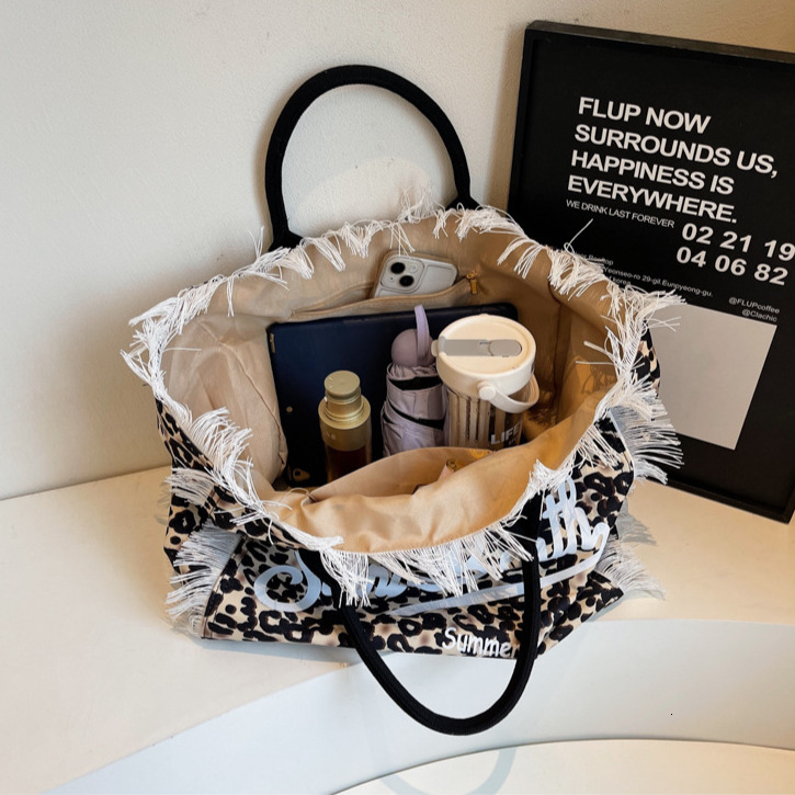 New Women's Large Capacity Leopard Print Canvas Handbag Free Shipping Designer Fashion Travel Bag Handmade Tassel Luxury Shopping Single Shoulder