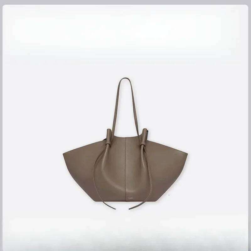 Fashionable multifunctional portable wing large capacity women s bag arm lower leather handbag