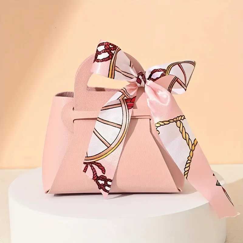 5/10 pieces leather gift bag bow packaging bag wedding gift distribution bag candy packaging box mini handbag purchase. Y250814