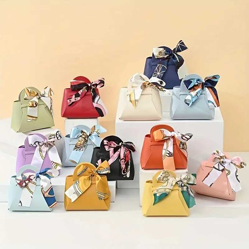 5/10 pieces leather gift bag bow packaging bag wedding gift distribution bag candy packaging box mini handbag purchase. Y250814
