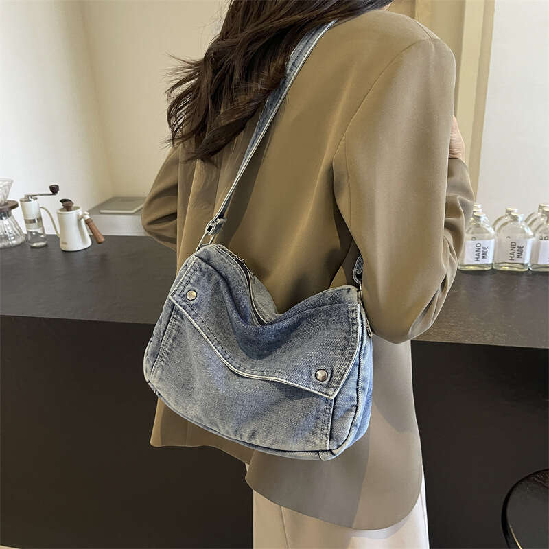 2025 Bags Designer Women New Niche Geometric Pillow Fashion Denim Crossbody Single Shoulder Underarm Bag