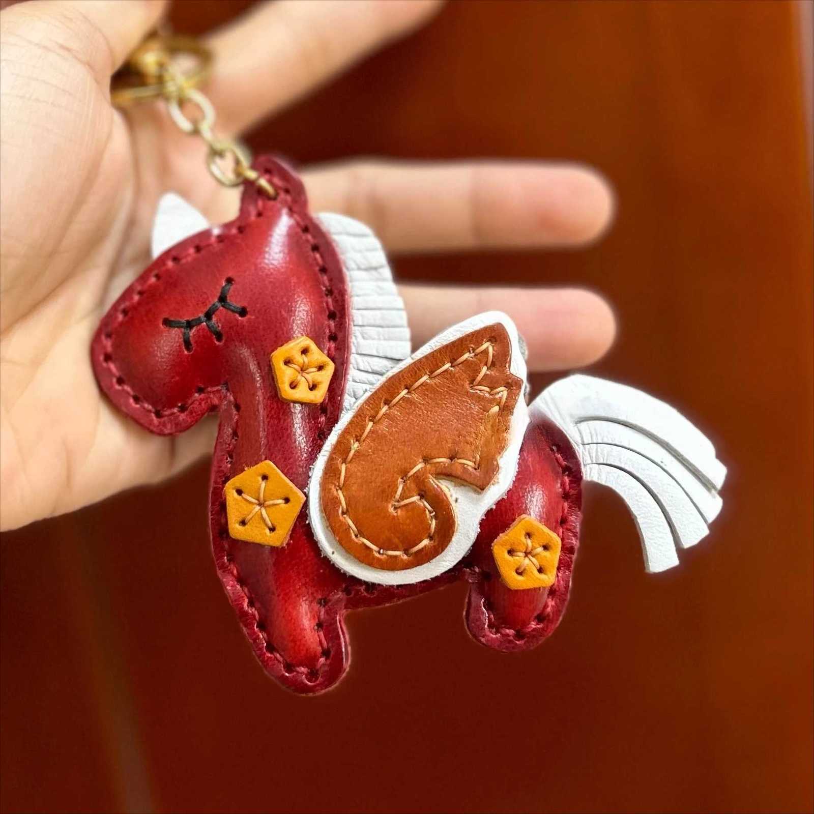 The top layer of cowhide hand-sewn unicorn pendant keychain pendant car keychain color block simulation decoration S250814