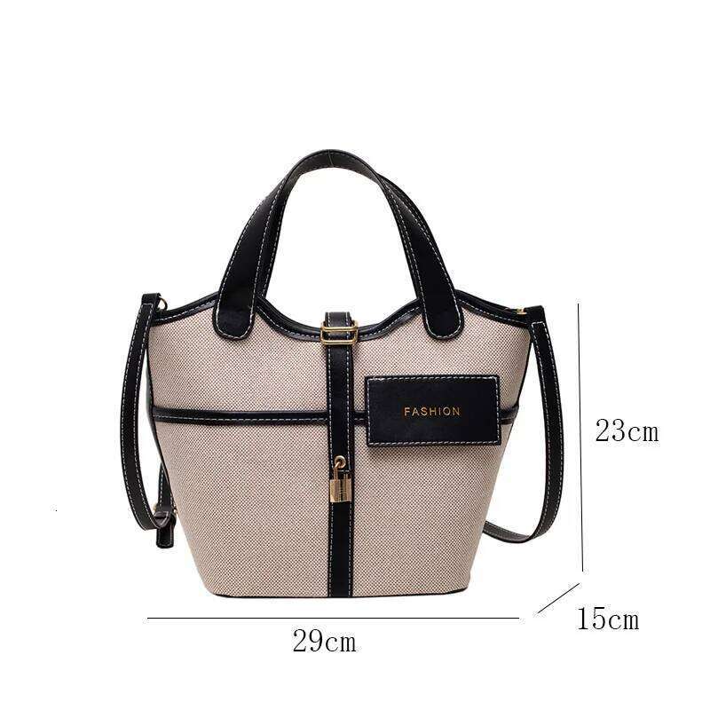 Retro Canvas PU Spliced Bucket New Women S Personalized Design Large Capacity Crossbody Bag Versatile Commuting Handbag