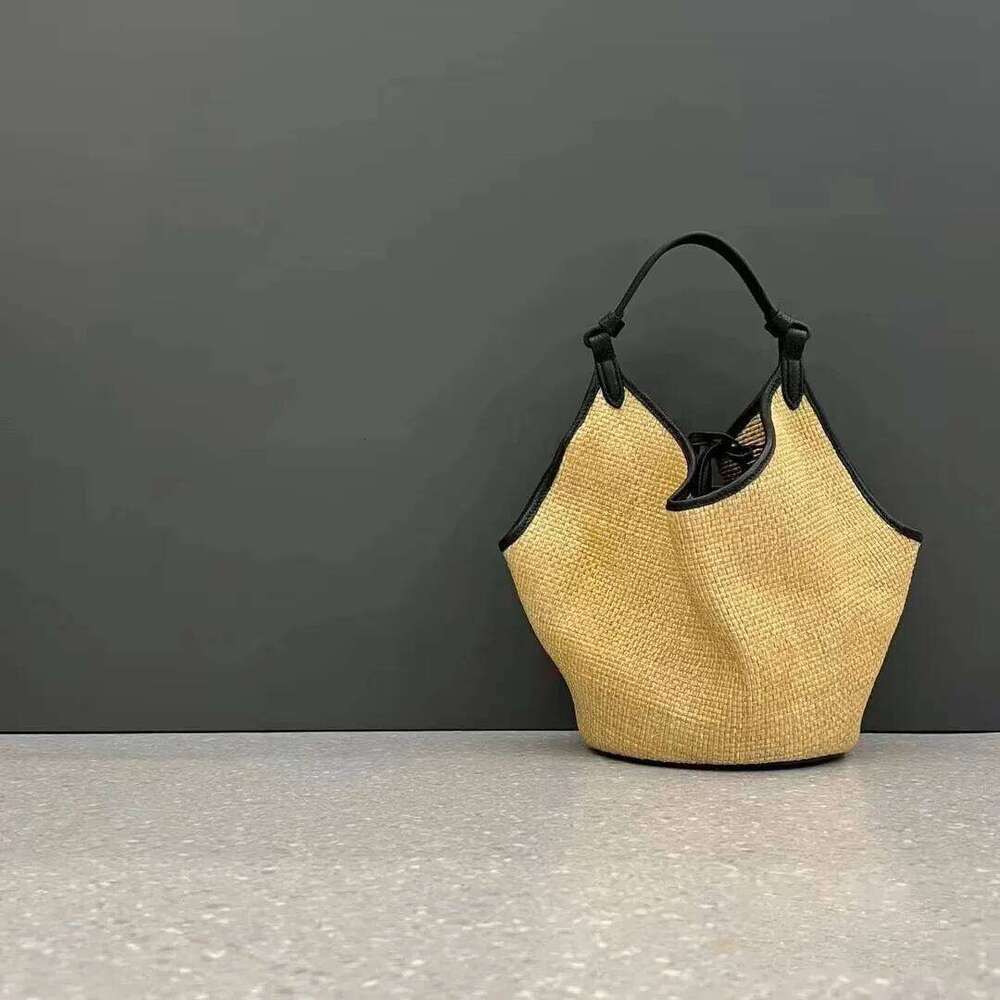 Lafite splicing head layer cowhide woven 2025 new niche design fashion summer vacation beach women underarm shoulder bag