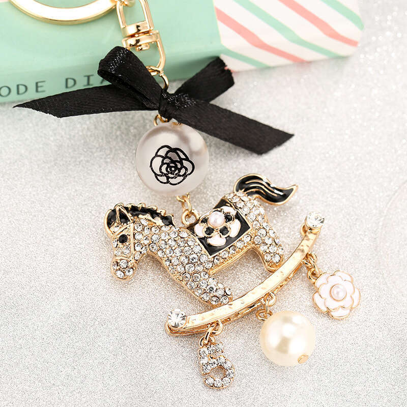 Korean Style New Diamond-Encrusted Carousel Car Pendant Bowknot Pearl Keychain Fashion Bag Accessories