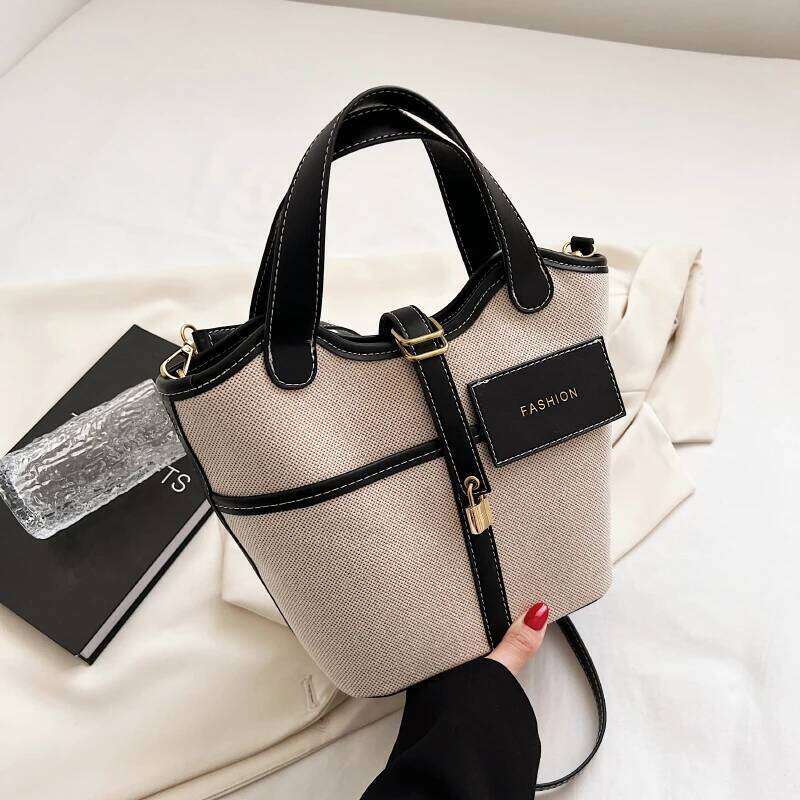 Retro Canvas PU Spliced Bucket New Women S Personalized Design Large Capacity Crossbody Bag Versatile Commuting Handbag