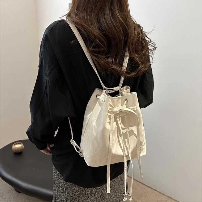 Trend Womens Crossbody Bucket Bag String Design High Quality S Size Versatile Autumn Fashion Korean Leisure Handbag Backpacks XJ250814