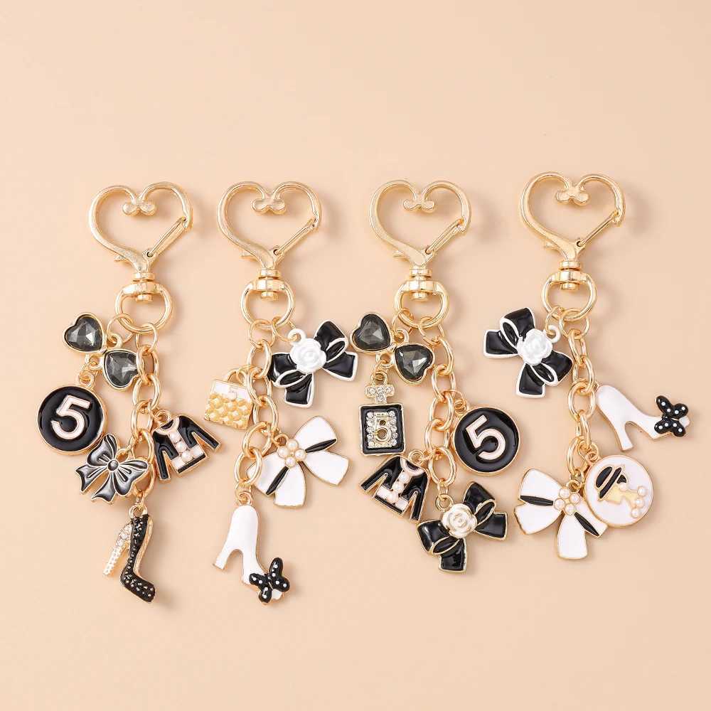 Fashion Enamel Women Hat Coat Keychain Pearl Flower Key Ring Pendants for Handbag Decoration DIY Handmade Jewelry Gifts Y250814