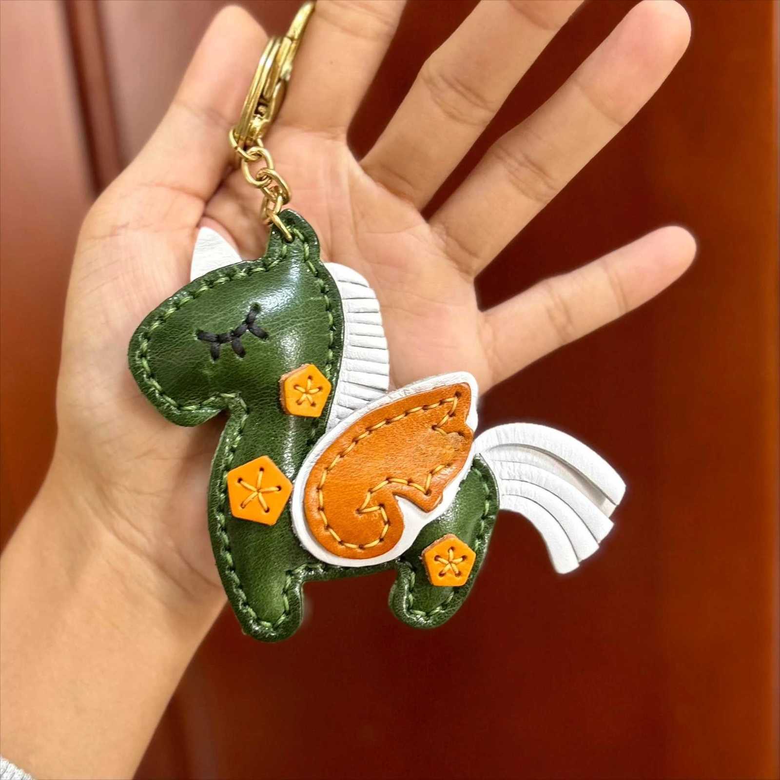 The top layer of cowhide hand-sewn unicorn pendant keychain pendant car keychain color block simulation decoration S250814