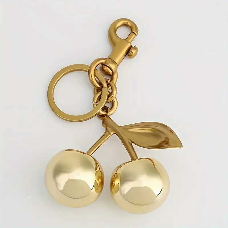 Golden Cherry Keychain Charm Shiny Resin Metal Bag Accessory Elegant Gift for Women Purse or Handbag Decoration S250902
