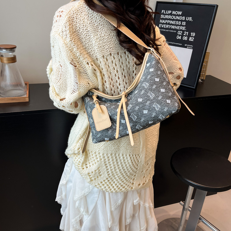 2025 New Women's Designer Handbag High-end Large Capacity Commuting Retro Color Block Leisure Multifunctional Single Shoulder Horizontal Bag Wall