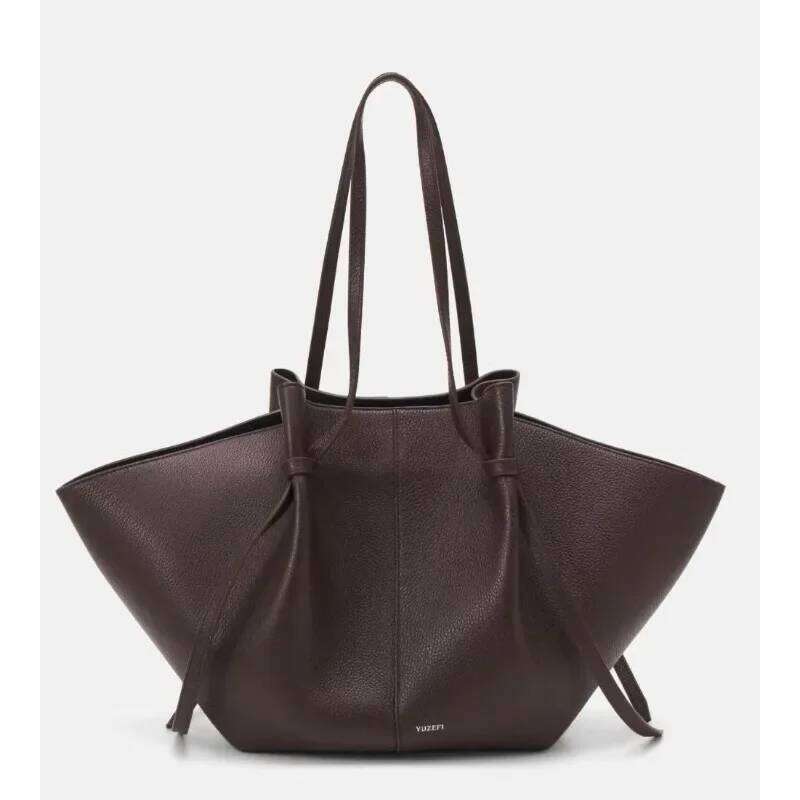 Fashionable multifunctional portable wing large capacity women s bag arm lower leather handbag