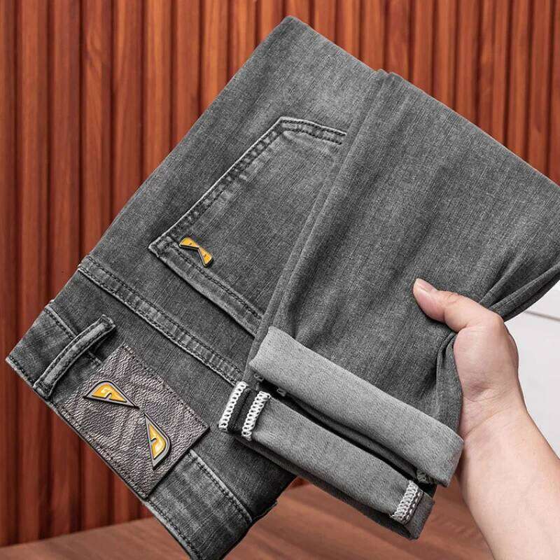 2024 spring and summer new high-end affordable fashion jeans men's stretch denim slim fit tapered casual trousers