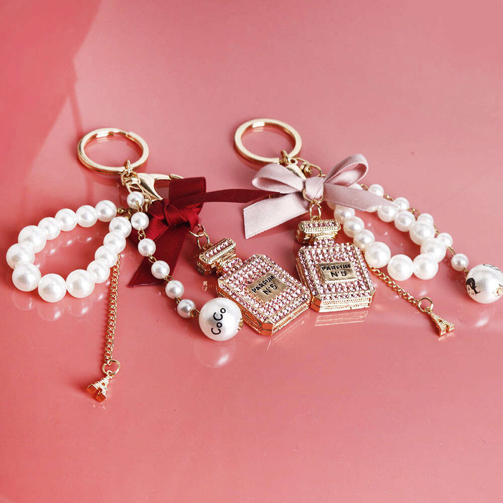 Korean Version Creative Full Diamond Inlaid Perfume Bottle Keychain for Women, Bowknot Pearl Bag Pendant Small Gift