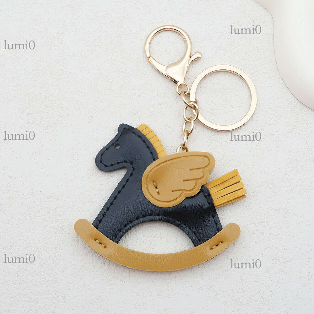 New Hot-Selling Shaking Pegasus Keychain Creative Bag Pendant PU Leather Little Wooden Horse Car Ornament