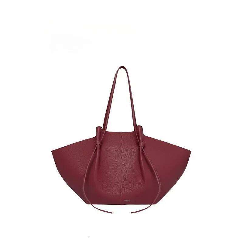 Fashionable multifunctional portable wing large capacity women s bag arm lower leather handbag