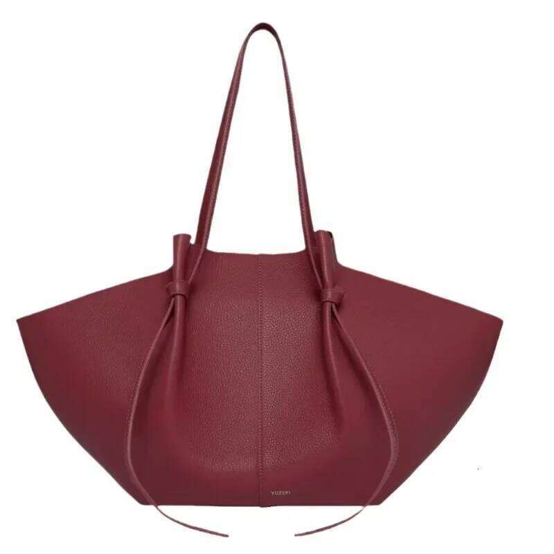 Fashionable multifunctional portable wing large capacity women s bag arm lower leather handbag