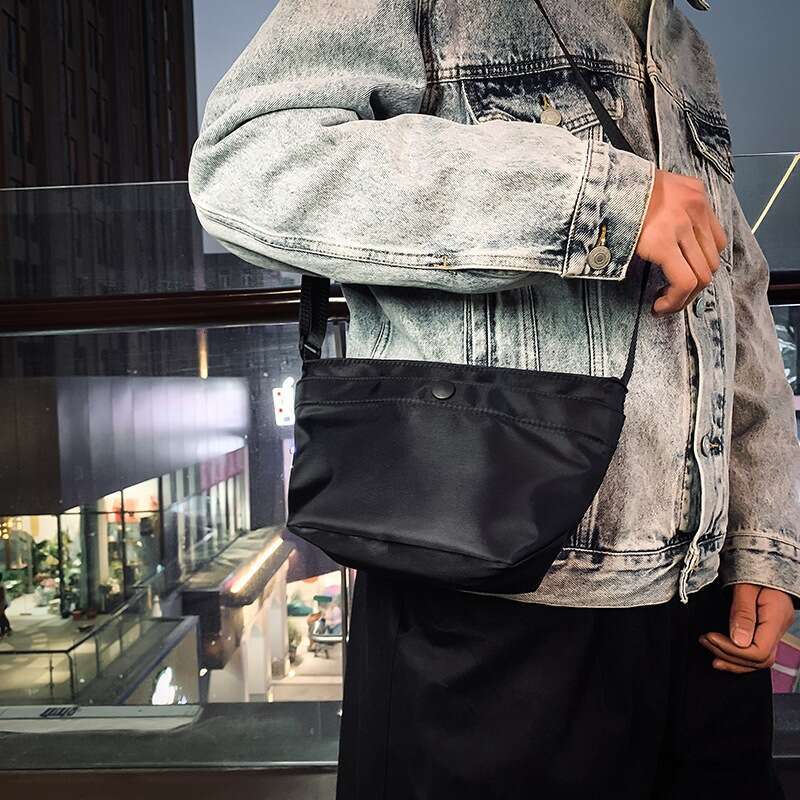 2025 New Korean Style Simple Crossbody Bags Designer Women Small Women Versatile Oxford Cloth Shoulder Harajuku Casual Bucket Bag for Men