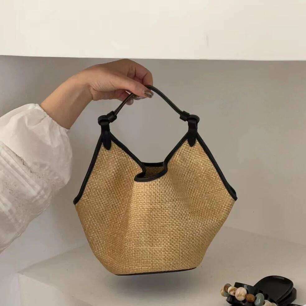 Lafite splicing head layer cowhide woven 2025 new niche design fashion summer vacation beach women underarm shoulder bag