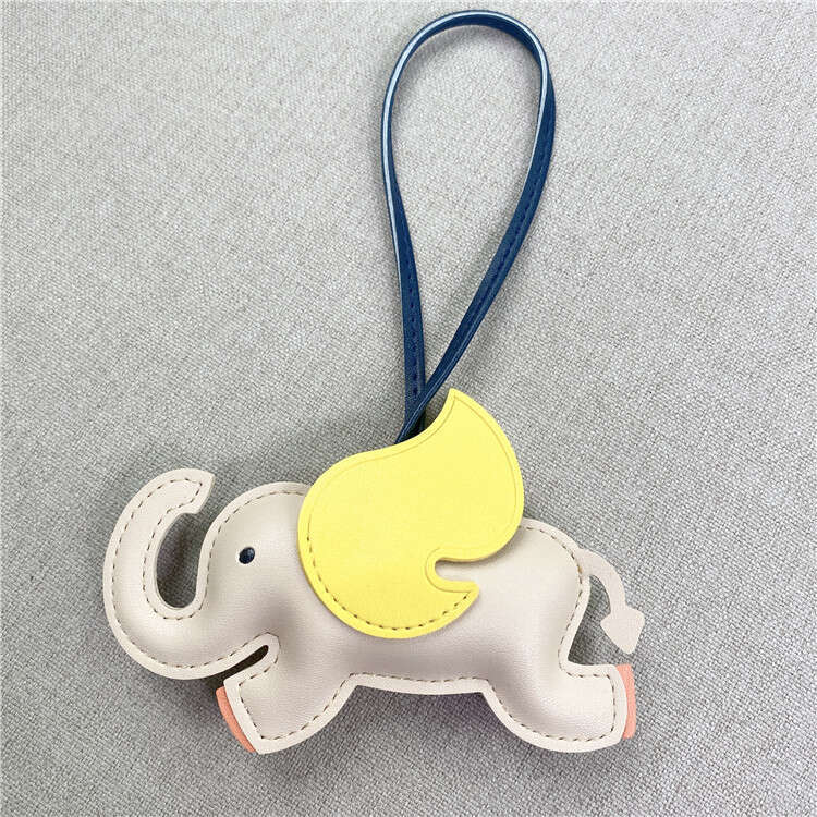 Bag Charms New Designer charm Angel Dumbo Bag Pendant Cute Personalized Keychain Car Rearview Mirror Decoration