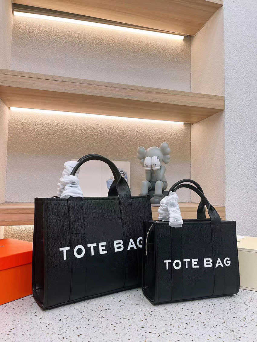 designer bag 2025 The tote bag Designer bags Women men High quality leather Fashion high-capacity Shoulder Letter printing Shopping Handbag 2 multiple colors 30