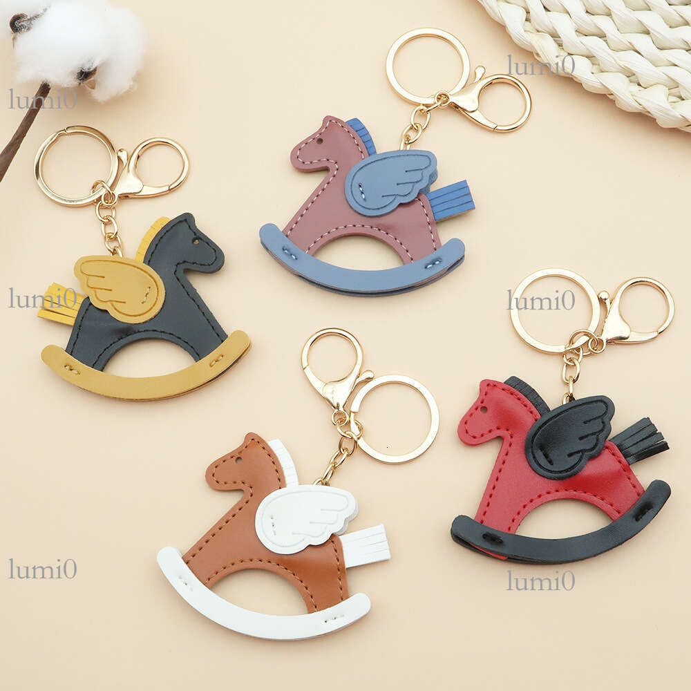 New Hot-Selling Shaking Pegasus Keychain Creative Bag Pendant PU Leather Little Wooden Horse Car Ornament