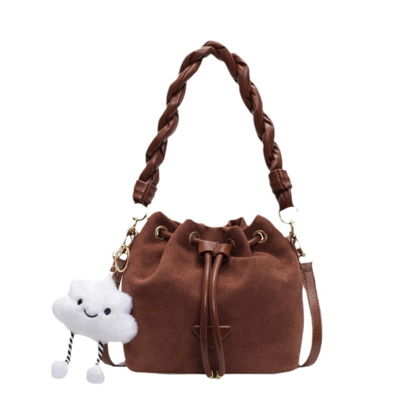 Trendy and niche fashion frosted drawstring design crossbody bag 2025 new style popular and versatile crossbody and hand - held bucket bag